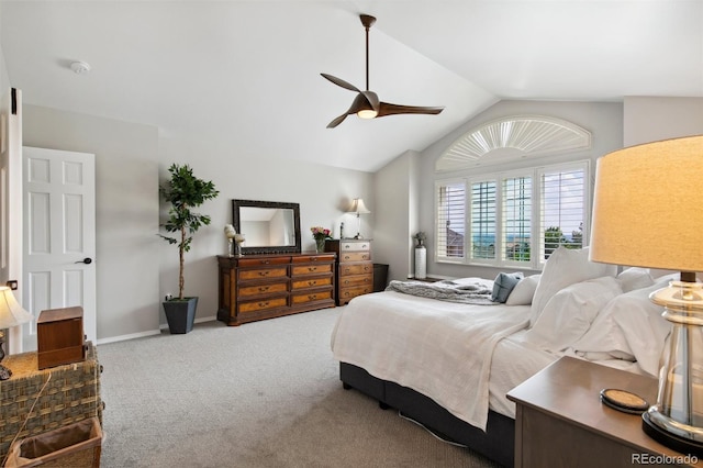 bedroom featuring carpet, lofted ceiling, and ceiling fan