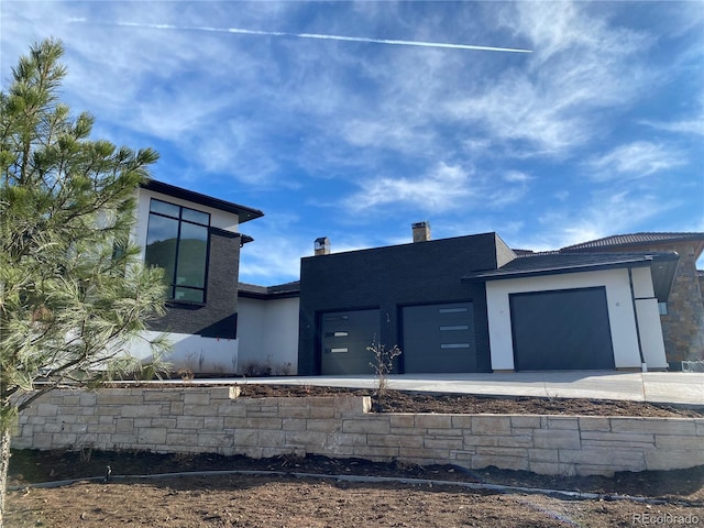 view of front of home with a garage