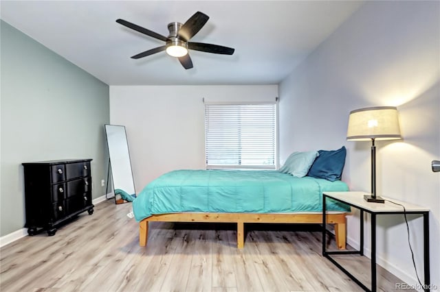 420 Wright St Unit 101, Lakewood, CO 80228 - bedroom featuring wood finished floors, baseboards, and ceiling fan