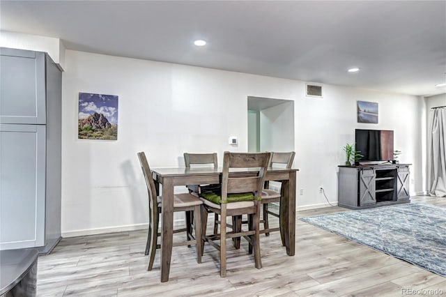 420 Wright St Unit 101, Lakewood, CO 80228 - dining room with light wood-style floors and recessed lighting