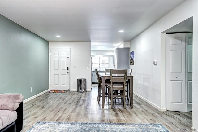 420 Wright St Unit 101, Lakewood, CO 80228 - dining space featuring light wood finished floors and recessed lighting