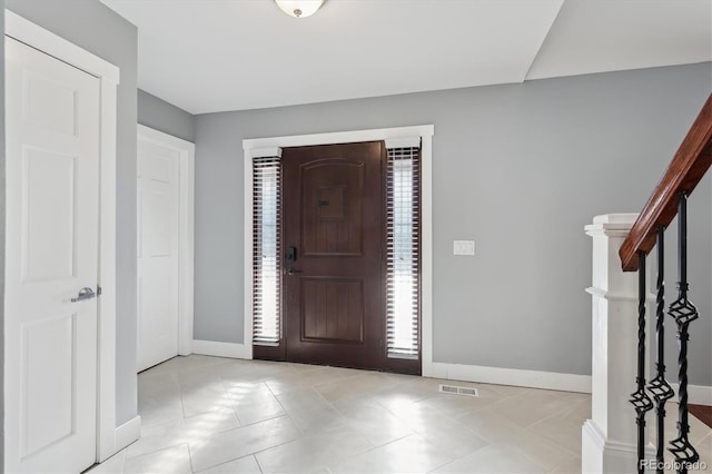 view of tiled foyer entrance