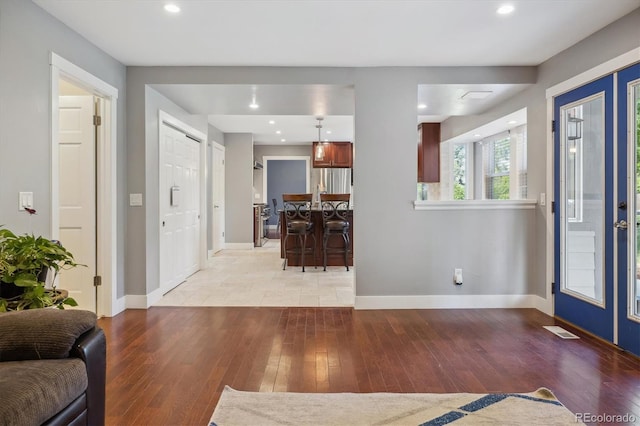 foyer featuring light wood-type flooring