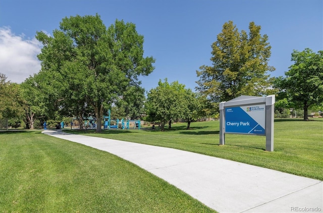 view of home's community with a lawn