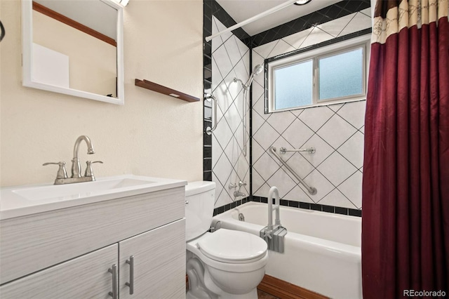 bathroom featuring shower / bathtub combination with curtain, toilet, and vanity