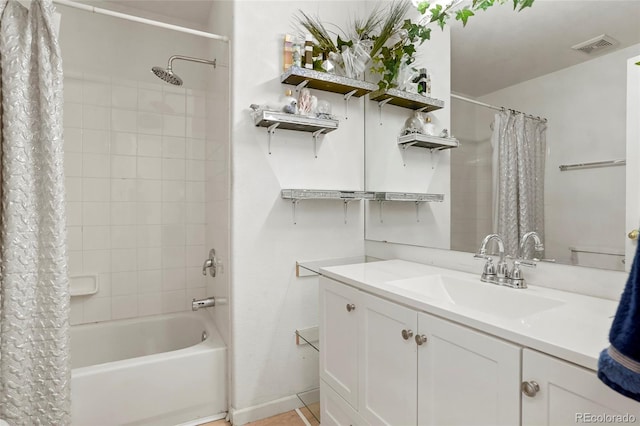 20292 E 47th Ave, Denver, CO 80249 - full bath with visible vents, shower / tub combo with curtain, baseboards, and vanity