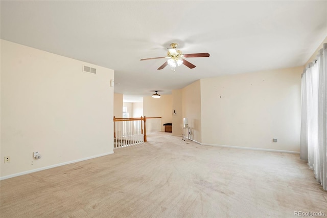20292 E 47th Ave, Denver, CO 80249 - unfurnished room with ceiling fan, visible vents, light carpet, and baseboards