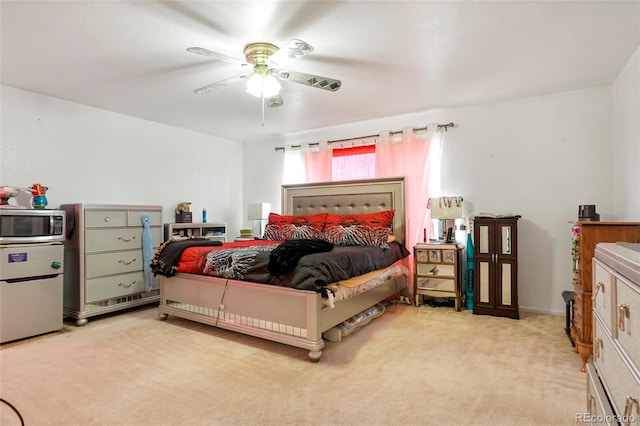 20292 E 47th Ave, Denver, CO 80249 - bedroom with a ceiling fan, fridge, and light colored carpet