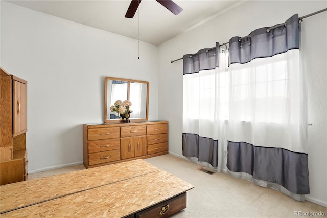 20292 E 47th Ave, Denver, CO 80249 - bedroom with light colored carpet, baseboards, ceiling fan, and visible vents