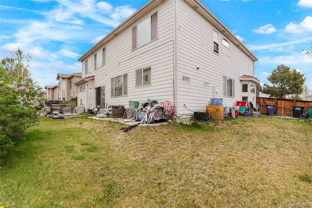 20292 E 47th Ave, Denver, CO 80249 - back of property featuring a lawn and fence