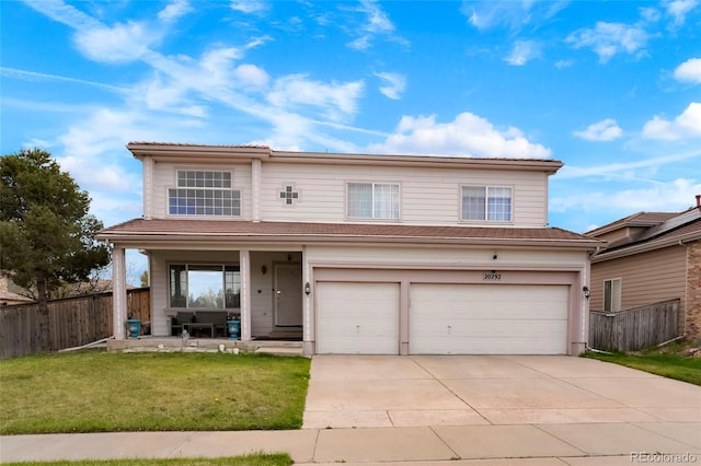 20292 E 47th Ave, Denver, CO 80249 - traditional-style home with a front lawn, fence, covered porch, concrete driveway, and an attached garage