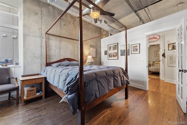 bedroom featuring hardwood / wood-style floors