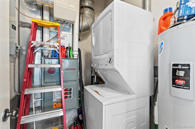 washroom featuring water heater and stacked washing maching and dryer