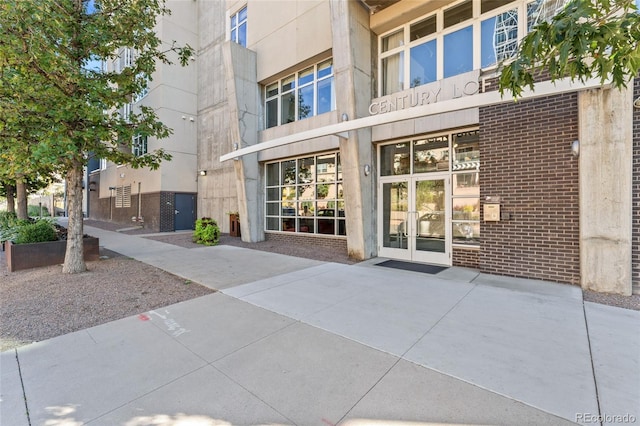 290 W 12th Ave Unit 303, Denver, CO 80204 - entrance to property featuring french doors and brick siding