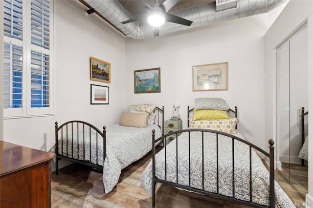 290 W 12th Ave Unit 303, Denver, CO 80204 - bedroom featuring a closet, ceiling fan, and wood finished floors