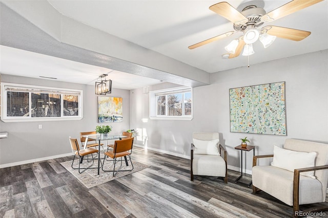 dining space featuring dark hardwood / wood-style floors and ceiling fan