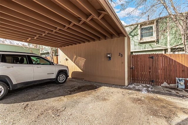 view of home's exterior with fence