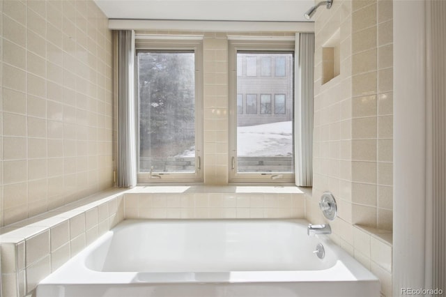 full bath with tile walls and a washtub
