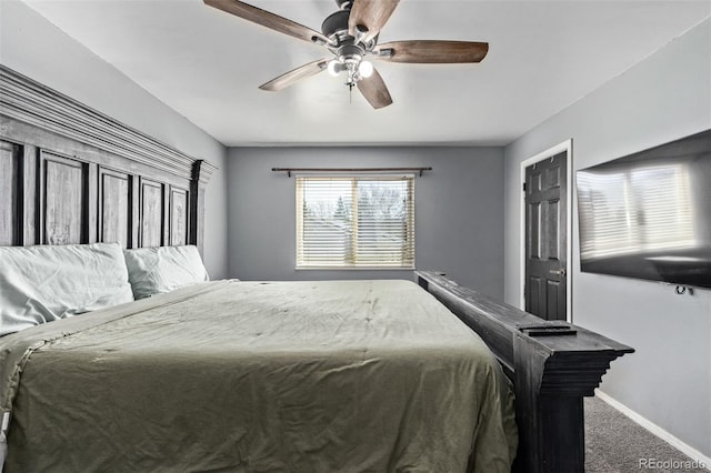 bedroom with carpet floors, ceiling fan, and baseboards