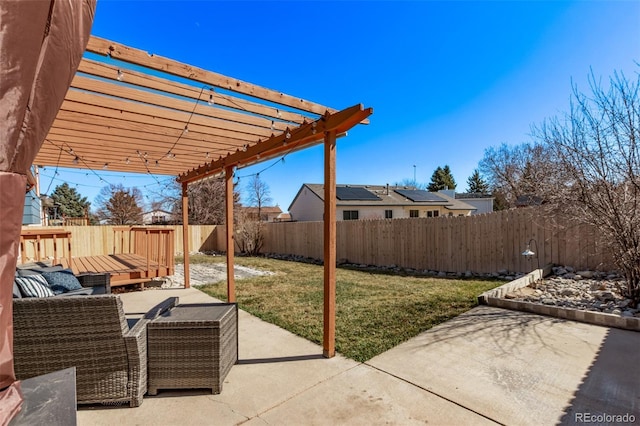 view of patio / terrace featuring a fenced backyard, an outdoor living space, and a pergola