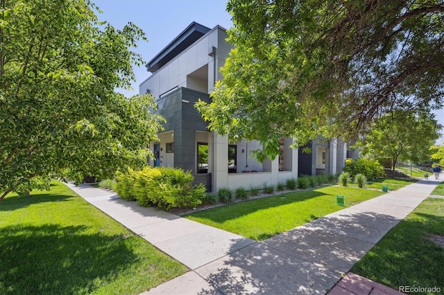 2898 W 22nd Ave, Denver, CO 80211 - view of property exterior featuring a lawn