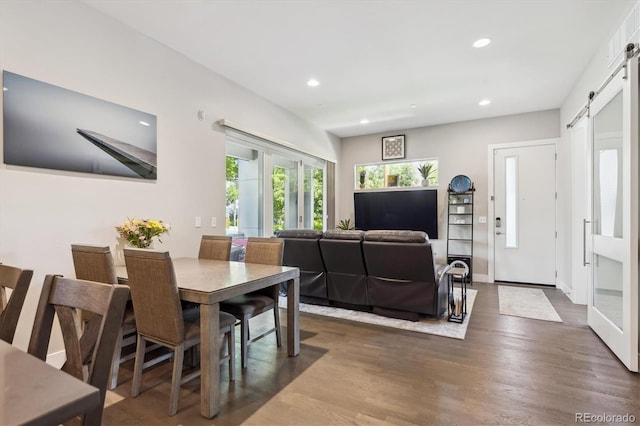 2898 W 22nd Ave, Denver, CO 80211 - dining room with a barn door, wood finished floors, and recessed lighting