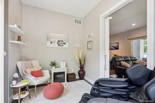 2898 W 22nd Ave, Denver, CO 80211 - sitting room with carpet, recessed lighting, a glass covered fireplace, and baseboards