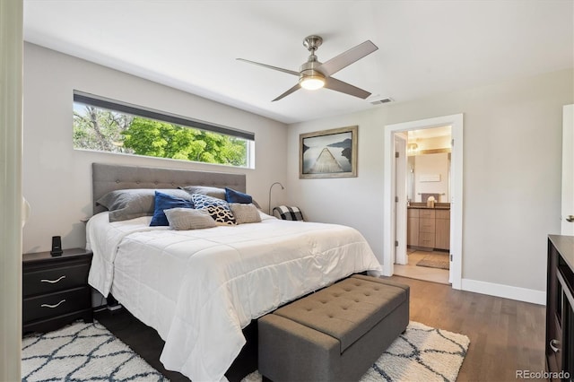 2898 W 22nd Ave, Denver, CO 80211 - bedroom featuring wood finished floors, baseboards, ensuite bathroom, and a ceiling fan