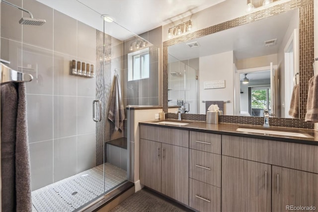 2898 W 22nd Ave, Denver, CO 80211 - bathroom with double vanity, a stall shower, and a ceiling fan