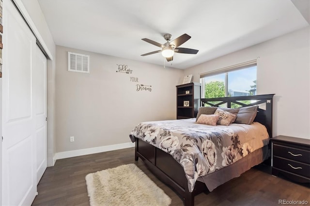 2898 W 22nd Ave, Denver, CO 80211 - bedroom with dark wood finished floors, a closet, baseboards, and a ceiling fan
