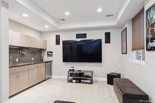 2898 W 22nd Ave, Denver, CO 80211 - living room with light carpet, beverage cooler, recessed lighting, baseboards, and a tray ceiling
