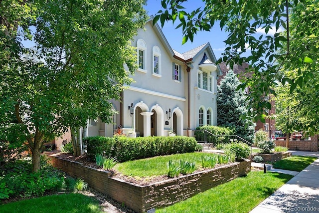 1164 S High St, Denver, CO 80210 - mediterranean / spanish home featuring stucco siding