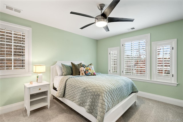 1164 S High St, Denver, CO 80210 - carpeted bedroom with baseboards and ceiling fan