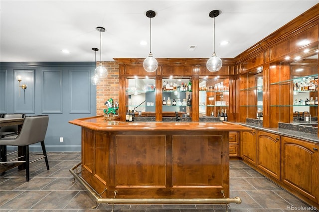 1164 S High St, Denver, CO 80210 - indoor wet bar with decorative light fixtures and wood walls