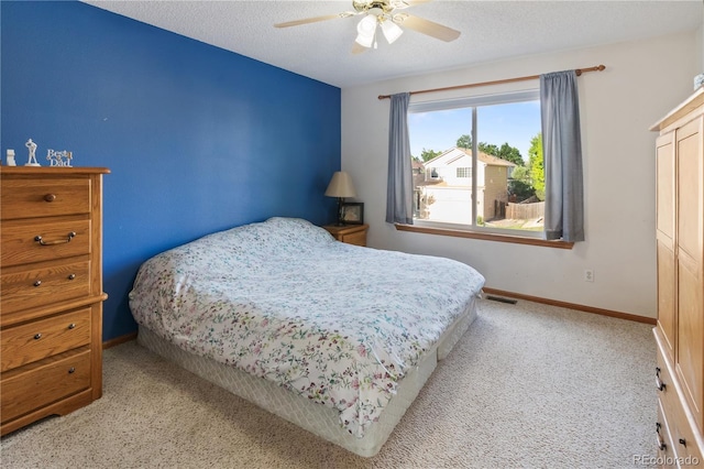 4363 E Andover Ave, Castle Rock, CO 80104 - bedroom featuring carpet flooring, a ceiling fan, and a textured ceiling