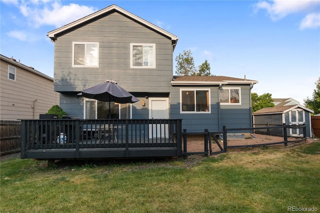 4363 E Andover Ave, Castle Rock, CO 80104 - rear view of house featuring a fenced backyard, a storage shed, and a wooden deck