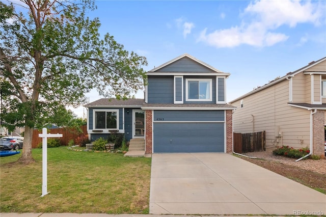 4363 E Andover Ave, Castle Rock, CO 80104 - view of front of property with a garage, brick siding, driveway, and a shingled roof