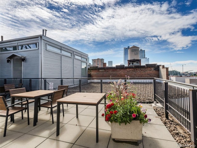 1449 Wynkoop St Unit 305, Denver, CO 80202 - view of patio / terrace featuring a balcony and outdoor dining area