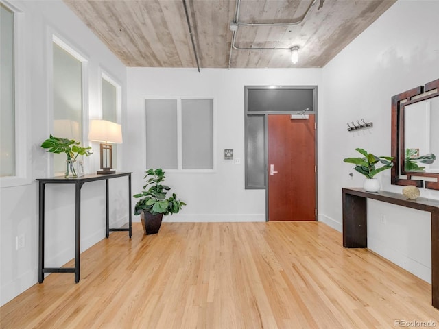 1449 Wynkoop St Unit 305, Denver, CO 80202 - unfurnished room featuring wood finished floors and baseboards