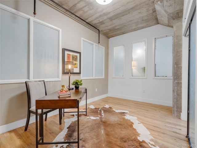 1449 Wynkoop St Unit 305, Denver, CO 80202 - home office with wood finished floors and baseboards