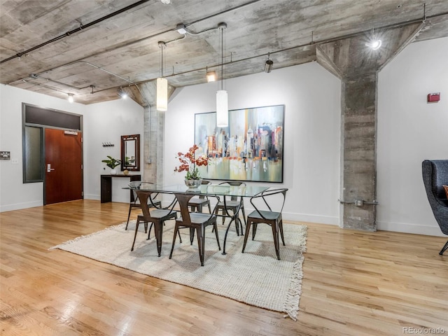 1449 Wynkoop St Unit 305, Denver, CO 80202 - dining area with wood finished floors and baseboards