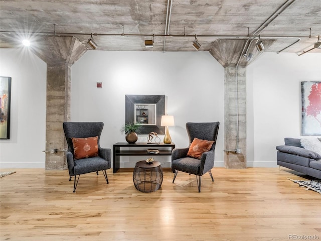1449 Wynkoop St Unit 305, Denver, CO 80202 - living area featuring wood finished floors and baseboards