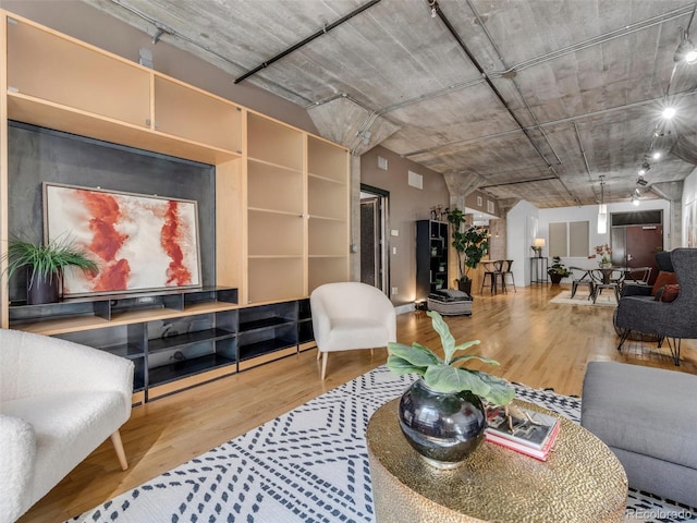 1449 Wynkoop St Unit 305, Denver, CO 80202 - living room with wood finished floors
