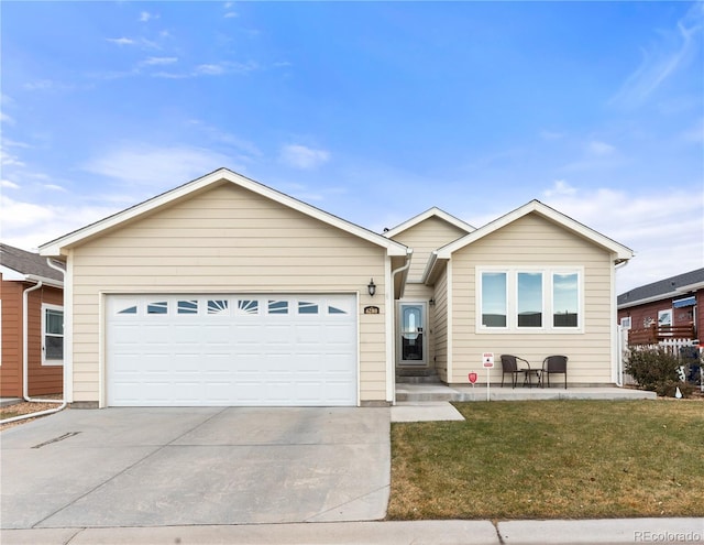 single story home with a front yard and a garage