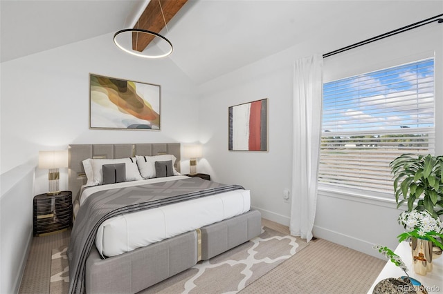 bedroom featuring light colored carpet and vaulted ceiling with beams