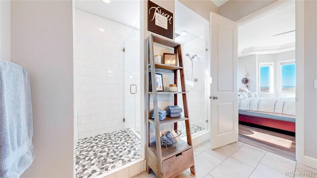 full bath featuring a stall shower, ensuite bath, and tile patterned floors