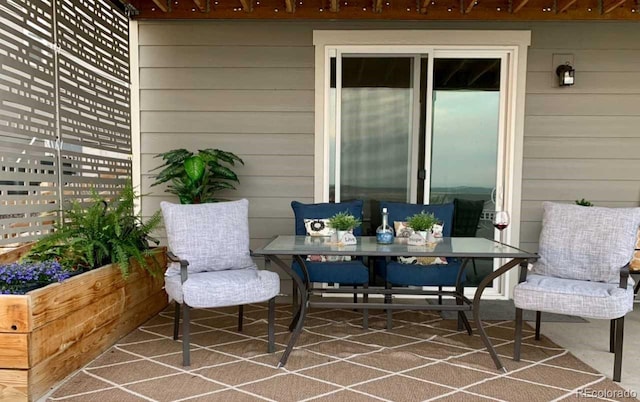 view of patio with outdoor dining space