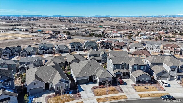 bird's eye view with a residential view and a mountain view