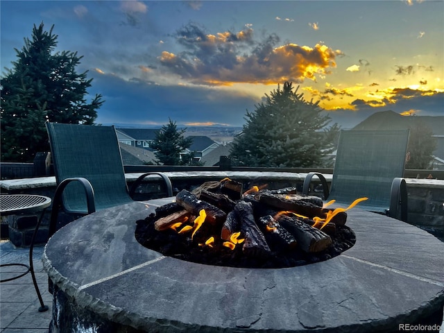 exterior space with a fire pit