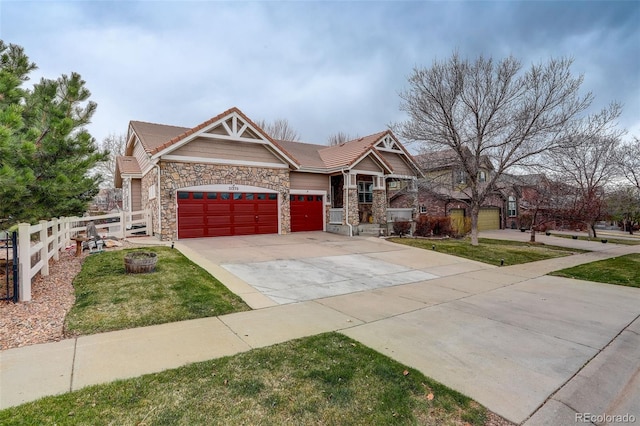 21270 E Eldorado Dr, Aurora, CO 80013 - craftsman-style home featuring a garage, driveway, and stone siding